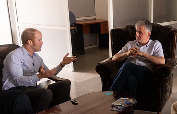Resources Photo of two people talking